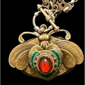 Vintage gold tone bumble bee toggle necklace with amber stone.